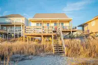 1919 E Beach Drive, Oak Island, NC 28465 — 4-bedroom waterfront home, Oak Island, NC, photo 1 of 40: download (34)
