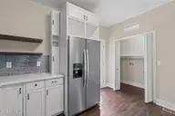 147 Creek Bend Drive, Vass, NC 28394 — 2-bedroom home in Riverview Acres, Vass, NC, photo 21 of 32: Stainless Steel Refrigerator