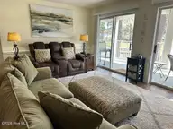 330 S Middleton Drive NW Unit 505, Calabash, NC 28467 — 2-bedroom waterfront condo in Brunswick Plantation, Calabash, NC, photo 19 of 72: 505 living room 3 - Copy - Copy