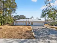 206 Azalea Circle, Sunset Beach, NC 28468 — 3-bedroom home in Shoreline Woods, Sunset Beach, NC, photo 1 of 48: 206 Azalea Cir