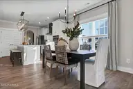 591 Heart Pine Avenue, Wilmington, NC 28411 — 4-bedroom home in Indigo at Abbey Preserve, Wilmington, NC, photo 11 of 31: Eat-In - Nantanaha - Cottages at Bradley