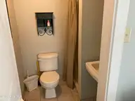 122 Ocean Boulevard E, Holden Beach, NC 28462 — 3-bedroom waterfront home, Holden Beach, NC, photo 21 of 39: Downstairs Bath