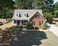 4530 Dewfield Drive N, Wilson, NC 27896 — 4-bedroom home in Dewfield, Wilson, NC, photo 3 of 41: 4530 Dewfield - Drone straight front