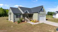 9001 Fox Trot Circle, Middlesex, NC 27557 — 3-bedroom home in Beaver Creek, Middlesex, NC, photo 2 of 33: 2-Side View