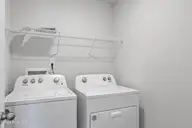 1103 Hanson Drive, Leland, NC 28451 — 3-bedroom home in East Lake, Leland, NC, photo 15 of 20: Walk-in Laundry