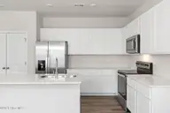 1063 Hanson Drive, Leland, NC 28451 — 3-bedroom home in East Lake, Leland, NC, photo 12 of 34: Lots of Cabinets