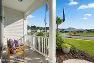 136a Arnette Drive SW 17a, Ocean Isle Beach, NC 28469 — 2-bedroom townhome in The Villas at Seaside, Ocean Isle Beach, NC, photo 3 of 24: front porch
