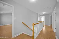 106 Bobwhite Circle, Cape Carteret, NC 28584 — 3-bedroom home in Quailwood Village, Cape Carteret, NC, photo 20 of 60: Stairway to 2nd Floor