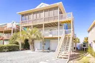 1131 S Shore Drive, Surf City, NC 28445 — 4-bedroom waterfront home in Horse Hammock, Surf City, NC, photo 1 of 40: Main