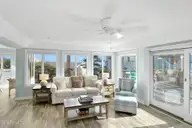 301 Salter Path Road 12 Genesis, Pine Knoll Shores, NC 28512 — 3-bedroom waterfront condo in Genesis, Pine Knoll Shores, NC, photo 5 of 48: Open Living Room with Ocean Views