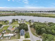 681 Forest Drive SE, Bolivia, NC 28422 — 2-bedroom waterfront home in Sunset Harbor, Bolivia, NC, photo 6 of 32: 8-web-or-mls-DJI_20250828123403_0259_D