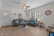 101 SW 28th Street, Oak Island, NC 28465 — 5-bedroom home in Pinners Point, Oak Island, NC, photo 11 of 56: Living Room