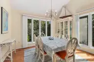 579 Coral Ridge Road, Pine Knoll Shores, NC 28512 — 4-bedroom waterfront home in Beacon's Reach, Pine Knoll Shores, NC, photo 15 of 62: Dining Area w/ Vaulted Ceiling