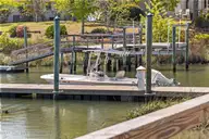 119 Waters Edge Drive, Hampstead, NC 28443 — 4-bedroom waterfront home in Deerfield, Hampstead, NC, photo 22 of 28: 015_119_waters_edge_drive-15_254