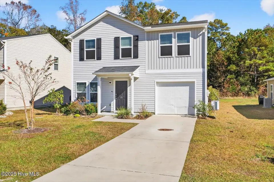 75 Shamrock Drive SW, Sunset Beach, NC 28468 — 3-bedroom home in Planters Green, Sunset Beach, NC, photo 1 of 4: Front