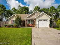 423 Blue Pennant Court, Sneads Ferry, NC 28460 — 3-bedroom home in Oyster Landing, Sneads Ferry, NC, photo 10 of 35: Front