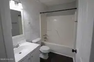 302 Paddock Place, Jacksonville, NC 28546 — 3-bedroom home in Horse Creek Farms, Jacksonville, NC, photo 5 of 16: guest bathroom