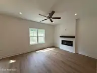 142 Carver Street, Carthage, NC 28327 — 3-bedroom home in Carriage Hills, Carthage, NC, photo 6 of 32: Fireplace