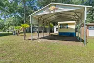 9136 E Calabash Drive SW, Calabash, NC 28467 — 2-bedroom manufactured home in Bonaparte Retreat, Calabash, NC, photo 1 of 26