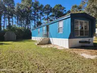15 Marlette Street, Hubert, NC 28539 — 2-bedroom manufactured home in Eastwood MHP, Hubert, NC, photo 1 of 17