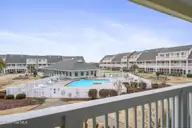 9201 Coast Guard Road F202, Emerald Isle, NC 28594 — 1-bedroom waterfront condo in Pebble Beach, Emerald Isle, NC, photo 3 of 44: 43-web-or-mls-PB-F202-2-26-26-017
