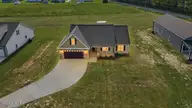 215 Bay Valley Road, Kenly, NC 27542 — 4-bedroom home, Kenly, NC, photo 2 of 30: 001-495566-DJI_20260812172040_0162_D_Twi