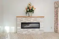 96 Deerwood Lane, Pinehurst, NC 28374 — 3-bedroom home in Pinehurst No. 6, Pinehurst, NC, photo 11 of 45: Primary Fireplace