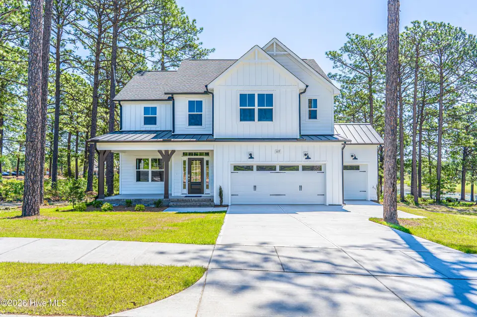613 Watauga Lane, Aberdeen, NC 28315 — 4-bedroom home in Legacy Lakes, Aberdeen, NC, photo 1 of 48: Front