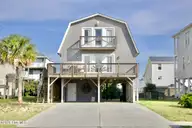 2016 N New River Drive, Surf City, NC 28445 — 4-bedroom waterfront home in Old Settlers Beach, Surf City, NC, photo 1 of 56