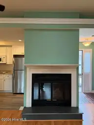 120 Sandham Court, Seven Lakes, NC 27376 — 2-bedroom townhome in Seven Lakes South, Seven Lakes, NC, photo 16 of 33: Fireplace