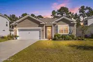 1736 Culdees Lane SE Lot 11, Bolivia, NC 28422 — 4-bedroom home in Avalon, Bolivia, NC, photo 1 of 58: 1736CuldeesLn-13_twilight_c6698555