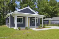 165 Long Pond Loop, Swansboro, NC 28584 — 2-bedroom waterfront condo in Cabins at Old Horse, Swansboro, NC, photo 2 of 25: Exterior Front
