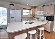 39 Lee Street, Ocean Isle Beach, NC 28469 — 4-bedroom waterfront home, Ocean Isle Beach, NC, photo 12 of 47: Kitchen3