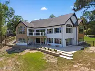 304 Gull Road, Hampstead, NC 28443 — 3-bedroom waterfront home in Olde Point, Hampstead, NC, photo 3 of 50: 45-DJI_20260420143733_0259_D-Edit