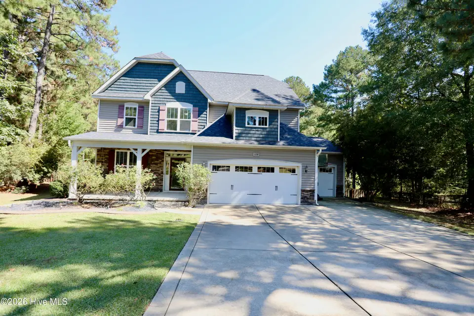 128 Whisper Grove Court, Whispering Pines, NC 28327 — 4-bedroom home in Whisper Grove, Whispering Pines, NC, photo 1 of 44