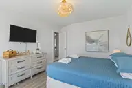 2205 E Beach Drive, Oak Island, NC 28465 — 6-bedroom waterfront home in Long Beach, Oak Island, NC, photo 23 of 55