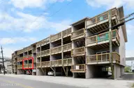 505 N Carolina Beach Avenue Unit 1c, Carolina Beach, NC 28428 — 2-bedroom waterfront condo in Winds at Carolina Beach, Carolina Beach, NC, photo 2 of 44: Front