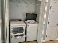 113 Gladiola Drive, New Bern, NC 28562 — 3-bedroom home in Surrey Downs, New Bern, NC, photo 6 of 12: Laundry closet