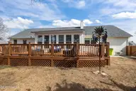 100 Stevens Court, Swansboro, NC 28584 — 3-bedroom waterfront home in River Reach, Swansboro, NC, photo 14 of 56: Back Porch