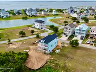 102 Marshland Circle, Newport, NC 28570 — 4-bedroom waterfront home in Cannonsgate, Newport, NC, photo 11 of 19: Aerial