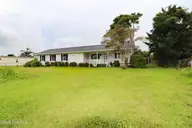 115 Canal Drive, Harkers Island, NC 28531 — 2-bedroom manufactured home, Harkers Island, NC, photo 3 of 23: Ext 2