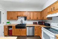 143 Sutton Drive, Elizabeth City, NC 27909 — 3-bedroom home in Carolina Village, Elizabeth City, NC, photo 5 of 18: 143 Sutton Drive Kitchen 2