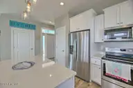 124 Salt Marsh Way, Atlantic Beach, NC 28512 — 4-bedroom waterfront home in Salt Marsh Villas, Atlantic Beach, NC, photo 5 of 32: Pink7