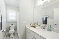 202 NE 64th Street, Oak Island, NC 28465 — 3-bedroom home, Oak Island, NC, photo 17 of 49: Guest full bathroom