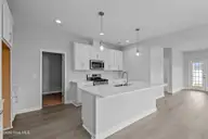 4153 Workman Loop 68, Leland, NC 28451 — 4-bedroom home in East Lake, Leland, NC, photo 11 of 28: Example - Kitchen