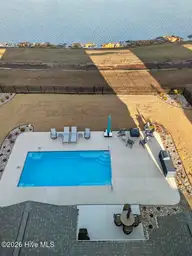 411 Summerhouse Drive, Holly Ridge, NC 28445 — 4-bedroom waterfront home in Summerhouse On Everett Bay, Holly Ridge, NC, photo 15 of 73: DJI_20260216165437_0767_D