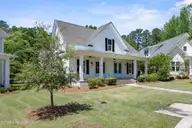 321 Jenoa Drive, Castle Hayne, NC 28429 — 3-bedroom home in River Bluffs, Castle Hayne, NC, photo 2 of 68: 2_front exterior