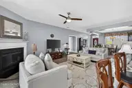 1230 Nightingale Court, Leland, NC 28451 — 3-bedroom waterfront home in Waterford of the Carolinas, Leland, NC, photo 10 of 75: Living Room