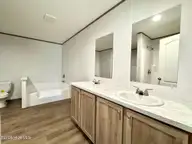 1319 Bill Hooks Road, Whiteville, NC 28472 — 3-bedroom manufactured home, Whiteville, NC, photo 10 of 24: Master Bath
