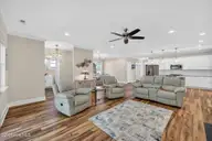 460 Summerhouse Drive, Holly Ridge, NC 28445 — 4-bedroom home in Summerhouse On Everett Bay, Holly Ridge, NC, photo 8 of 73: open living, dining and kitchen